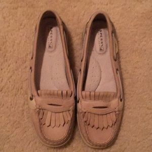Sperry slip ons.
